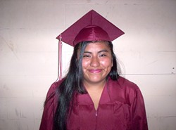 DRESSED FOR SUCCESS :  Teen mom Guadalupe Garcia graduated with honors in June and is now attending Cal Poly. - PHOTO COURTESY OF ECONOMIC OPPORTUNITY COMMISSION