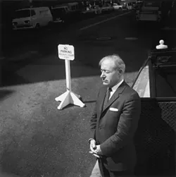 NO PARKING : Tress captured this image of a San Franciscan enjoying a moment of sunshine, his posture echoed by a nearby sign. - PHOTO BY ARTHUR TRESS