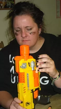 THE MOTIVATOR : Nothing makes everyone want to hide like a mad Maeva Considine packing heat. Nerf heat. - PHOTO BY NICK POWELL