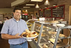 INGREDIENTS FOR SUCCESS : Cider Creek Bakery co-owner Ken Jevec invites customers in with a pie and a smile. - PHOTO BY STEVE E. MILLER