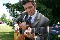 MAGIC FINGERS : Watch New York guitar sensation and song man William Nicholson make it look easy when he plays Linnaea’s Café on June 13. - PHOTO COURTESY OF WILLIAM NICHOLSON