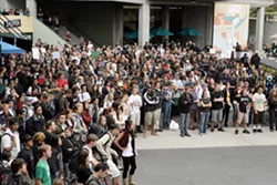 GATHERING : Hundreds of students gathered for a protest against racial signs and symbols reported at Cal Poly’s Crops House. - PHOTO BY STEVE E. MILLER