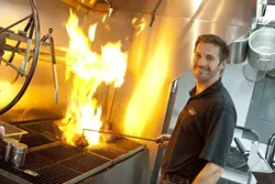 COOKING IT OLD SCHOOL : Mathew Pearce is bringing authentic Santa Maria-style barbecue to downtown San Luis Obispo. - PHOTO BY STEVE E. MILLER