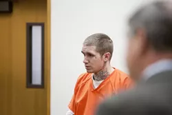 WORTH A FIGHT? : Vallejo resident Austin Sarna, 22, fielded questions from Superior Court Judge John Trice at a preliminary hearing in the assault and attempted murder case against him on Dec. 13. Defense attorney Fred Foss is pictured in the foreground. - FILE PHOTO BY STEVE E. MILLER