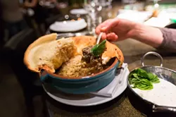 APART FROM THE FLOCK: Adelaida Springs Ranch lamb is paired with homemade naan and a cool yogurt sauce at Foremost Wine Company in downtown - SLO. An array of local and global wines accompany each locally sourced plate at the new, farm-fresh haunt. - PHOTO BY KAORI FUNAHASHI