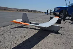 PUMA POWER: The Federal Aviation Administration cleared this 13-pound “Puma” drone, manufactured by AeroVironment—a California UAV company—for limited commercial use on July 26. - PHOTO BY RHYS HEYDEN