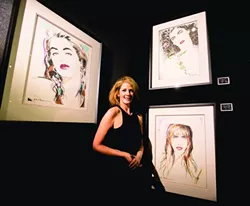 THE MODEL: Jane Youdelman poses under her portrait (upper right). - PHOTO BY HENRY BRUINGTON
