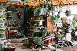 POTTED POTPOURRI:  Left Field features a multitude of tribal rugs, pots, and decorative masks. - PHOTO COURTESY OF JENNIFER YOUNG