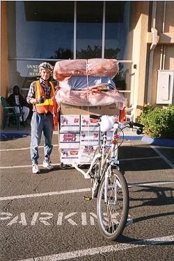 THE BIG MOVE: :  James Stoughton designed and built a hitch and wagon so he could move an entire apartment&rsquo;s worth of stuff&mdash;11 trips at 650 pounds a load&mdash;with his bike. - PHOTO COURTESY KAY STOUGHTON