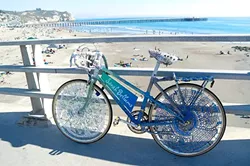 TWO WHEELS, ONE MESSAGE : Local eco activist Sarah Bellum spreads wonder and curiosity wherever she goes thanks to a bike featuring crocheted plastic trim. - PHOTO COURTESY OF SARAH BELLUM