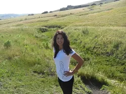 THE WOMAN WITH THE PLAN : Cal Poly student Melissa Soroushian, here modeling an ECOSLO T-shirt, put on the fashion show for her senior project, with proceeds benefiting ECOSLO. - PHOTO COURTESY OF MELISSA SOROUSHIAN