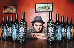 BOTTLES SINCE BOYHOOD:  Brian Benson grew up around wine, and now releases vintages through his Brian Benson Cellars. - PHOTO BY STEVE E. MILLER