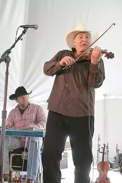 FUNNY BUT GOOD! : Fiddler Chisholm Wills makes funny faces when he plays, but he’s awesome as part of Kenny Kenning’s band. - PHOTO BY GLEN STARKEY
