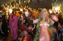 LAISSEZ LES BONS TEMPS ROULER! : Attendees at ARTS Obispo’s ARTI Gras event took to the dance floor at the Madonna Inn on Feb. 13. - PHOTO BY GLEN STARKEY