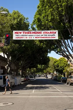FLYING HIGH : If you’re driving down Higuera Street and can’t remember what you’re supposed to be doing this week, look up! - PHOTO BY STEVE E. MILLER