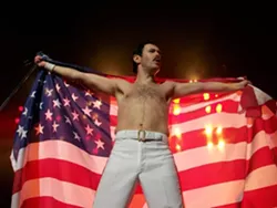 HE WILL ROCK YOU! : Gary Mullen takes on the role of Freddie Mercury in the Queen tribute show, One Night of Queen, playing March 13 at the Performing Arts Center’s Cohan Center. - PHOTO COURTESY OF ONE NIGHT OF QUEEN