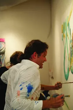 PAINT WAR!: Louis Zimmerman wields a paintbrush and some sweet kung fu to try to finish his animal. - PHOTO BY GLEN STARKEY