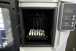 PRINTING PLASTIC : This is an inside view of the new $35,000 prototyping machine used in Donald Rapoochi’s manufacturing class. - PHOTO BY STEVE E. MILLER