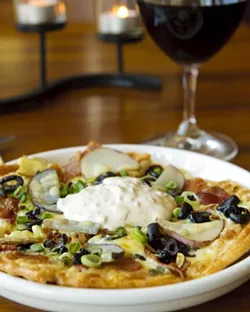 POTATO PIZZA? : Dishes like baked stuffed potato pizza cleverly meld comfort food and culinary art. - PHOTO BY STEVE E. MILLER