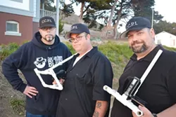 THE CREW: CCPI founder Mitch Flores (left), senior investigator Micah Watkins (center) and tech coordinator Rob Burr (right) prepare equipment for their paranormal investigation. - PHOTO BY RHYS HEYDEN