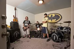 ROOM GALORE : Wes Price, Billy Gerhardt, and Nathan Jones (left to right), owners of the Sauce Pot rehearsal spaces, showcase the size of the rooms they have for musicians to rent. - PHOTO BY STEVE E. MILLER