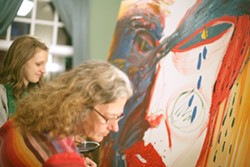 TAG TEAM :  Abby Berger (left) and Sandra Pendell team up to whip the group painting into shape. - PHOTO BY GLEN STARKEY