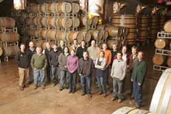 COMMON CAUSE : The Rhone Rangers (pictured here in the Robert Hall Winery caves) come together to promote American Rhone varieties. - PHOTO BY STEVE E. MILLER