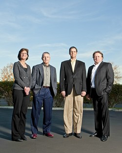 KCRF&rsquo;S CORE:  Sue Anderson, Steve Anderson, Patrick Kerans, and Frank Kalman drive the Kids&rsquo; Cancer Research Foundation as the group seeks out promising clinical - trials to battle children&rsquo;s cancer. Steve Anderson, Kerans, and Kalman&rsquo;s daughter Calli have all survived battles with cancer. - PHOTO BY STEVE E. MILLER