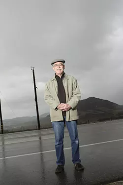 WIND WATCHER: Paul Allen is a retired county wind expert. He’s standing beside one of several wind stations that don’t factor into PG&E’s emergency plans. - PHOTOS BY STEVE E. MILLER