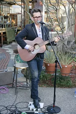 SING OUT, JODY! : Jody Mulgrew entertained the crowd in the courtyard of the shops at the Garden Shed.