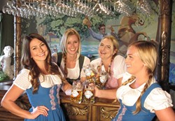 CHEERS AND 'BIERS':  The Madonna Inn 'Dirndl Girls' won&rsquo;t be the only ones dressed up for Madonna Inn and Firestone Walker's inaugural Oktoberfest this Saturday, Oct. 11. Firestone Walker Brewmaster Matt Brynildson plans to rock his own authentic lederhosen as the crowd chows down on traditional German grub. - PHOTO COURTESY OF MADONNA INN