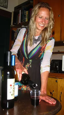 TRICKY POSE : “Hey, Ursala Black. Let me get a shot of you pouring some wine for me to drink. Oh geez … my camera won’t work. No, just keep pouring while I mess with the flash. Yeah, that’s the ticket.” - PHOTO NICK POWELL