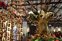 DEERLY BELOVED: An imposing and whimsical window display designed by Eve Chartrand greets visitors to Studios on the Park. - PHOTO BY JESSICA PEÑA