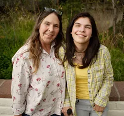 LOOKING UP : Doctors thought Ivy Alvarado (right) would never even regain consciousness after her heart suddenly failed but now she’s regaining motor skills, speech, and her sense of humor. Her mother Melinda Alvarado (left) faces staggering medical bills. - PHOTO BY STEVE E. MILLER