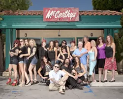 THE GANG’S ALL HERE : More than a dozen McCarthy’s regulars donated their time as models for the “Women of McCarthy’s” calendar, due for release on Nov. 1. - PHOTO BY STEVE E. MILLER