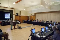 HAVING THEIR SAY : Susan Jordan, president of the non-profit California Coastal Protection Network, applauds the California Coastal Commission for their November denial of Pacific Gas & Electric’s controversial 3-D high-energy seismic studies. - PHOTO BY STEVE. E. MILLER