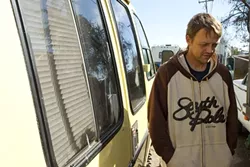 CASHED OUT : Chad McClure received three tickets in about a week for illegal occupancy. He received a citation after he moved his RV to Prado Road, where people said SLO police told them to go. - PHOTO BY STEVE E. MILLER