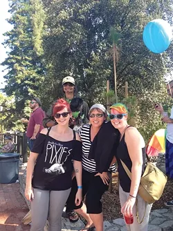 YOU’VE GOT A FRIEND IN ME: Friends Emily Katyryniuk, Peter Zepeda, Dice the wonder dog, Jaime Baker, and Aileen Manley soak up some sun and pride. - PHOTO BY MAEVA CONSIDINE