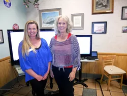 CHEERS : Karen Bright, who made a successful run for Grover Beach City Council, and Debbie Peterson, the future mayor of Grover Beach, paused during a particularly happening shindig at Station Grill in Grover Beach. - PHOTO BY TAYLER DUPREL