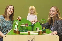 BRING ON THE GREEN: Ariana (left), Corrina (center), and Amanda (right) Spaulding are working toward a more environmentally friendly planet, one diaper at a time. - PHOTO BY STEVE E. MILLER