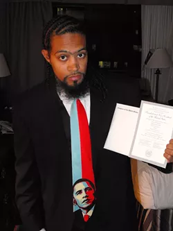 SANTA MARIA TO WASHINGTON, D.C.: Marcus King is vice-president of Allan Hancock College's Associated Student Body Government. Here, he's holding the inaugural tickets he received from U.S. Rep. Lois Capps'office. - PHOTO BY JEFF HAMSHER