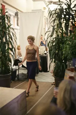 RUN, FOREST, RUN! : Cal Poly models sprint along the runway during a sustainable fashion show. - PHOTO BY GLEN STARKEY
