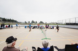 BACK AND FORTH:  National Pickleball champions Daniel Moore and Michael Stahl visited Morro Bay to show off their skills and share a - few new pointers with local players. - PHOTO BY KAORI FUNAHASHI