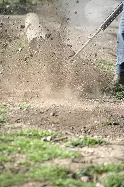 KA-BOOM! : The Rodenator fills squirrel holes with a mixture of propane and oxygen, then ignites the mixture, which results in an “instantaneous underground shockwave of concussive force,” which kills burrowing pests. - PHOTO BY GLEN STARKEY