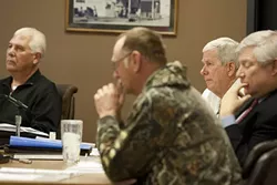 BON VOYAGE : South County Sanitation District Administrator John Wallace (second from right)—also president of the district’s engineering consultant, the Wallace Group—made a surprise announcement of his retirement after 27 years. - PHOTO BY STEVE E. MILLER