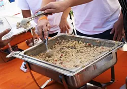 BETTER THAN A CHEESE STEAK: Jeffry’s Catering took home the Mac and Cheese Fest Second Place People’s Choice Award with a unique spin on the flavors found within a satisfying cheese steak sandwich. The “Paso Mac and Cheese Steak” dish boasted roasted garlic provolone cheese sauce, grilled peppers, and onions. - PHOTO BY REID CAIN