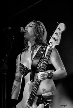 SHE’S A PUSSY: Nashville Pussy bassist Karen Cuda will provide the sights and sounds at Pozo Saloon’s four-band rock’n’roll extravaganza this July 4 that also includes music by Sexy Time Explosion, The Supersuckers, and headliners The Reverend Horton Heat. - PHOTO BY KR@WA