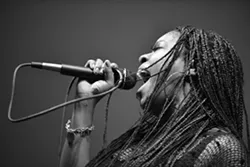 SING IT, SISTER!: Morgan Monroe of the soul band The Monroe will be one of three acts playing this year’s 2014 Zongo Time Traveler’s Ball on Dec. 31 at the Los Osos Community Center. - PHOTO BY LANCE KINNEY