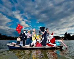ALL IN THE SAME BOAT : (DOUBLE TAKE) (l-r) Christy Heron (‘50s housewife), Amy Asman (mime), Chloe Rucker (farmer), Ellie Cattaneo (soccer player), Kristina Bennett (hippie), Brent Staple (businessman), Dora Mountain (beauty queen), Ed Connolly (Santa), and Heather Weltner (mermaid). Art director: Ashley Schwellenbach. Hair and makeup by Shelby Hood. Boat (the Mudhen) courtesy of Glen Starkey. - PHOTO BY STEVE E. MILLER