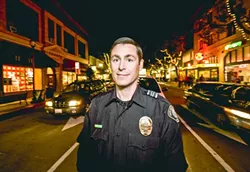 ON THE DRUNKEN TRAIL: Officer Tim Koznek (pictured) was assigned as a DUI enforcement officer after the SLOPD created the position last November. - PHOTO BY HENRY BRUINGTON